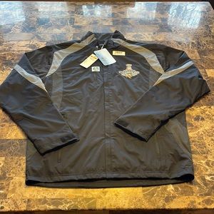Antigua Brand medium Pittsburgh Penguins rain jacket.